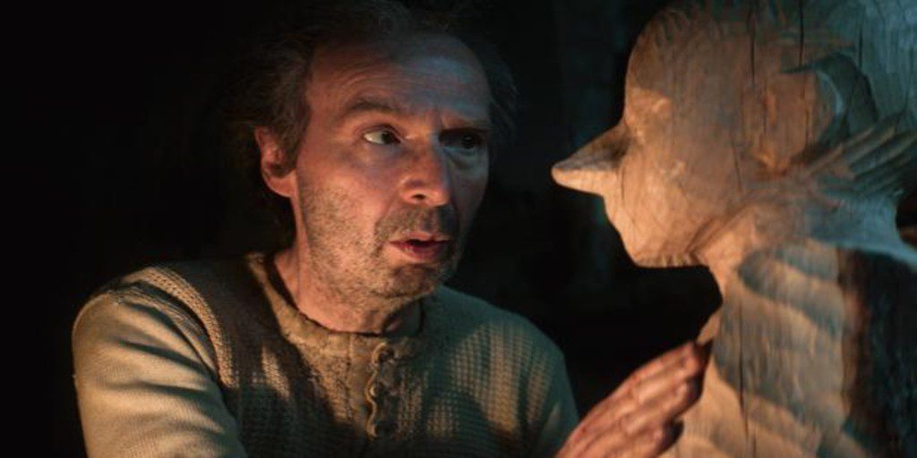 Geppetto (Roberto Benigni) tallando a Pinocho